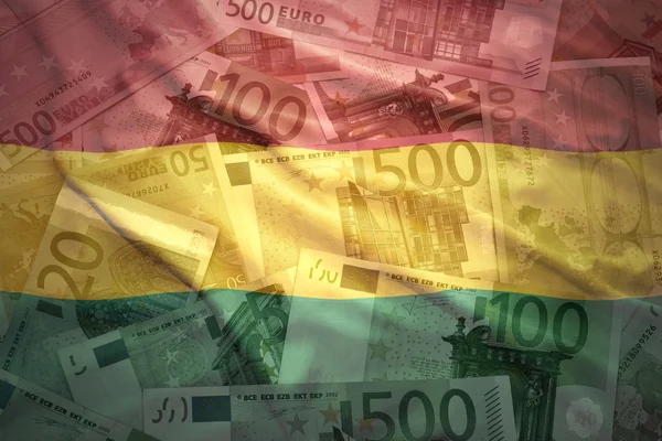 Colorful waving bolivian flag on a euro money background — Stok fotoğraf