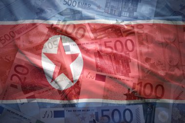 colorful waving north korea flag on a euro money background