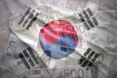 colorful waving korean flag on a euro money background