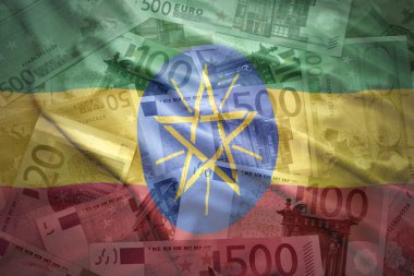 colorful waving ethiopian flag on a euro money background