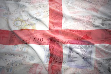 colorful waving english flag on a english pound sterling money background