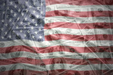 colorful waving united states of america flag on a american dollar money background