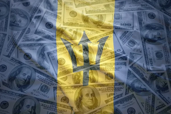 Colorful waving barbados flag on a american dollar money background — Stock Photo, Image