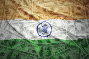 colorful waving indian flag on a american dollar money background