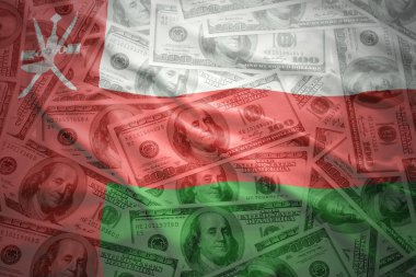 colorful waving omani flag on a american dollar money background