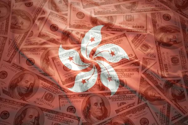 Colorful waving hong kong flag on a american dollar money background — Stock Photo, Image