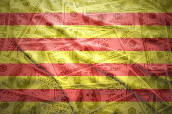 Colorido ondeando bandera catalonia en un dólar americano —  Fotos de Stock