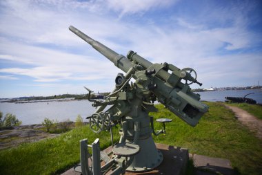 old weapon under blue dramatic skies, northern europe