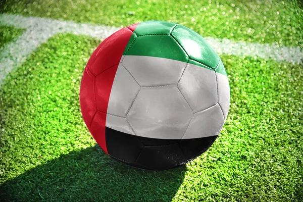 Bola de futebol com a bandeira nacional de emirados árabes unidos — Fotografia de Stock