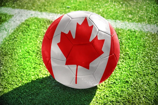 Pelota de fútbol con la bandera nacional de Canadá —  Fotos de Stock