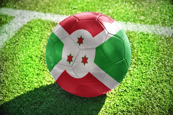 Pelota de fútbol con la bandera nacional de Burundi — Foto de Stock