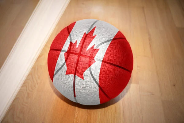 Pelota de baloncesto con la bandera nacional de Canadá —  Fotos de Stock