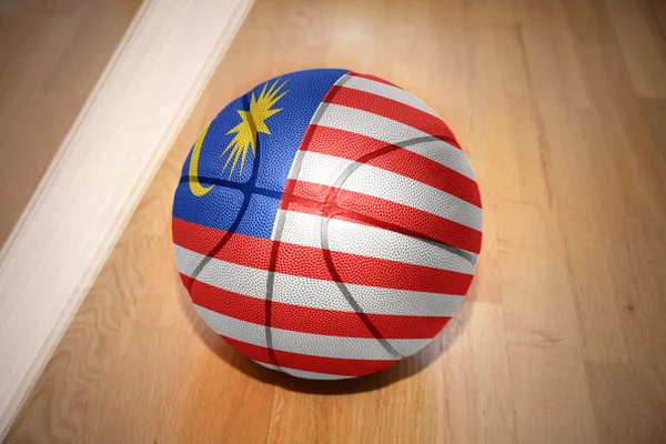 Basketball ball with the national flag of malaysia — Stock fotografie