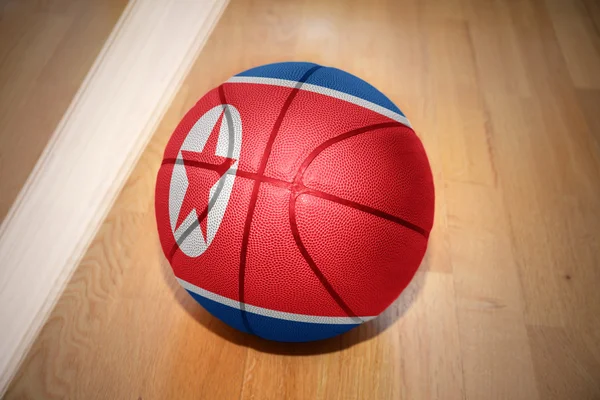Basketball ball with the national flag of north korea — Stock fotografie