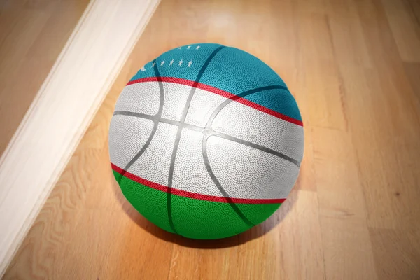 Basketballball mit der usbekischen Nationalflagge — Stockfoto