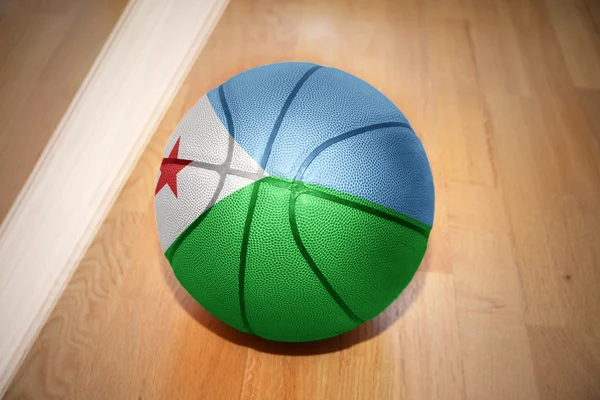 Pallone da basket con bandiera nazionale di Gibuti — Foto Stock