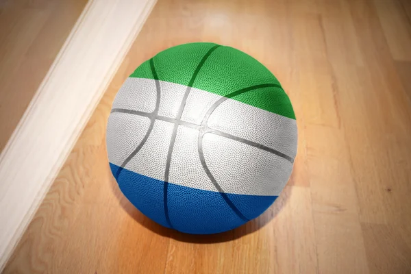 Basketball ball with the national flag of sierra leone — Stok fotoğraf