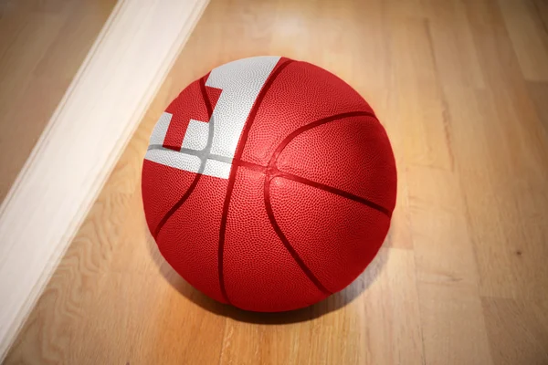 Basketball ball with the national flag of tonga — Stock fotografie