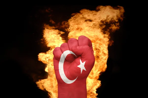 Fire fist with the national flag of turkey — Stock Photo, Image