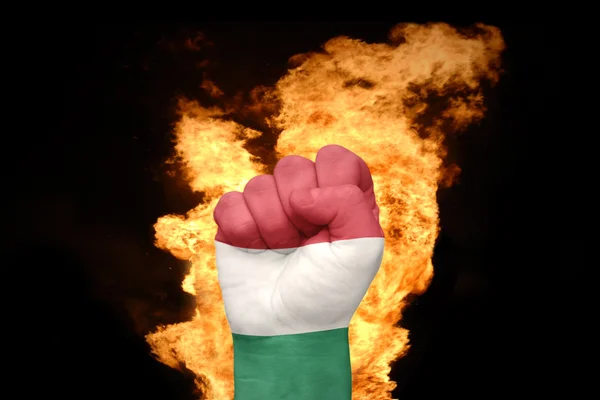 Fire fist with the national flag of hungary — Stock Photo, Image