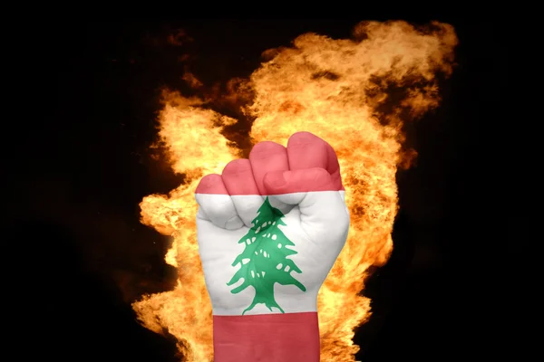 Fire fist with the national flag of lebanon — Stock Photo, Image