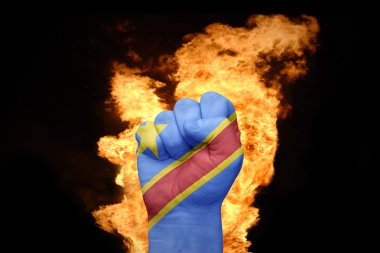 fire fist with the national flag of democratic republic of the congo clipart