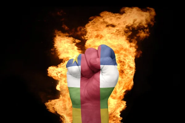 Fire näve med nationella flaggan i Centralafrikanska republiken — Stockfoto