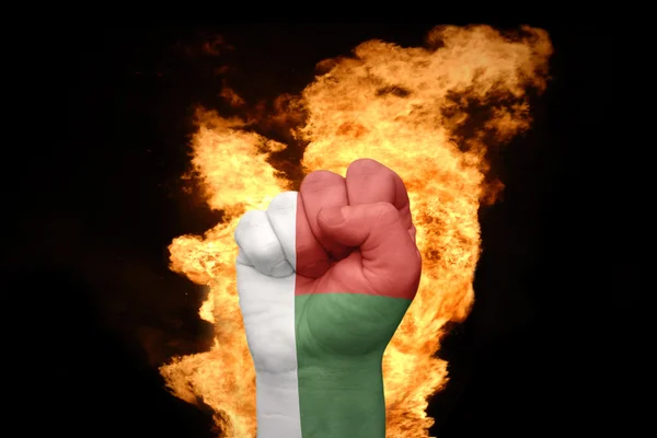 Fire fist with the national flag of madagascar — Stock Photo, Image