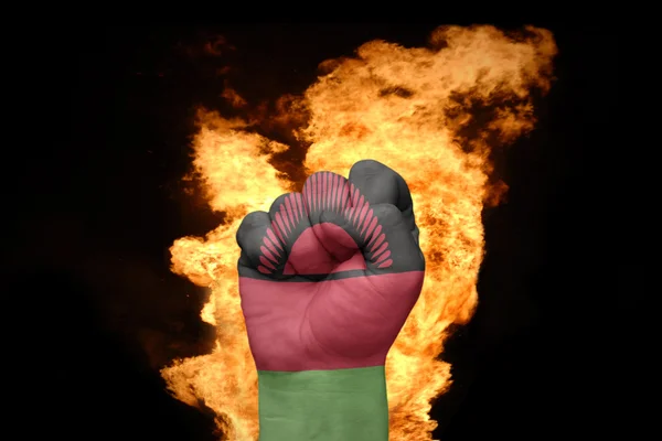マラウイの国旗と拳を発射します。 — ストック写真