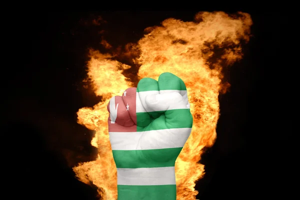 Fire fist with the national flag of abkhazia — Stock Photo, Image