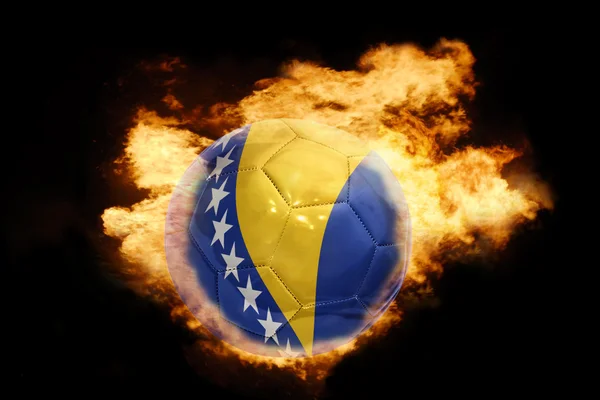 火にボスニア ・ ヘルツェゴビナの国旗とサッカー ボール — ストック写真