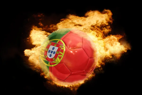 Pelota de fútbol con la bandera de portugal en llamas — Foto de Stock