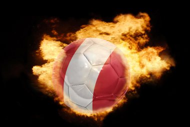 Futbol topu ile peru bayrağı yanıyor
