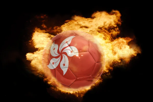火の香港の旗とサッカー ボール — ストック写真