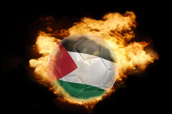 Football ball with the flag of jordan on fire — Stock Photo, Image