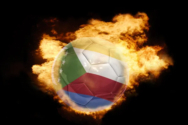 Ballon de football avec le drapeau des comores en feu — Photo