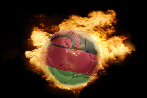 Voetbal bal met de vlag van malawi in brand — Stockfoto