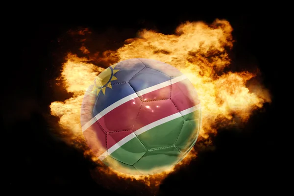 Ballon de football avec le drapeau de la namibie en feu — Photo
