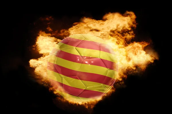 Football ball with the flag of catalonia on fire — Stock Photo, Image