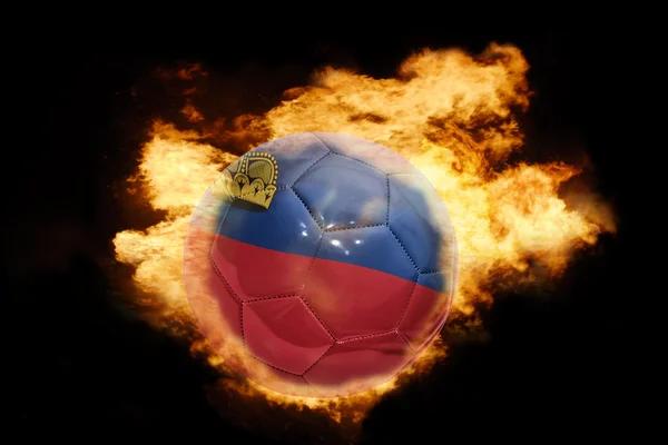 Ballon de football avec le drapeau du Liechtenstein en feu — Photo