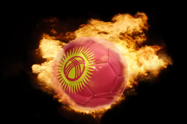 Ballon de football avec le drapeau du Kirghizistan en feu — Photo