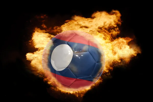 Ballon de football avec le drapeau des laos en feu — Photo