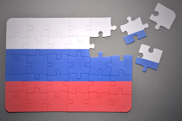 Puzzle with the national flag of russia — Stock Photo, Image