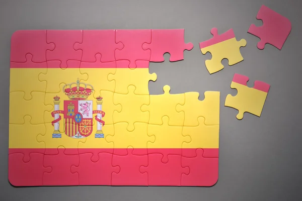 Puzzle with the national flag of spain — Stock Photo, Image