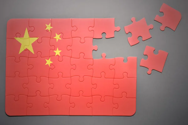 Puzzle s národní vlajkou Čína — Stock fotografie