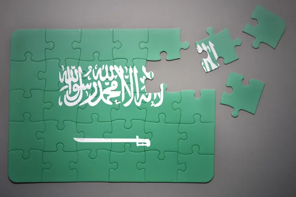 Quebra-cabeça com a bandeira nacional da Arábia Saudita — Fotografia de Stock