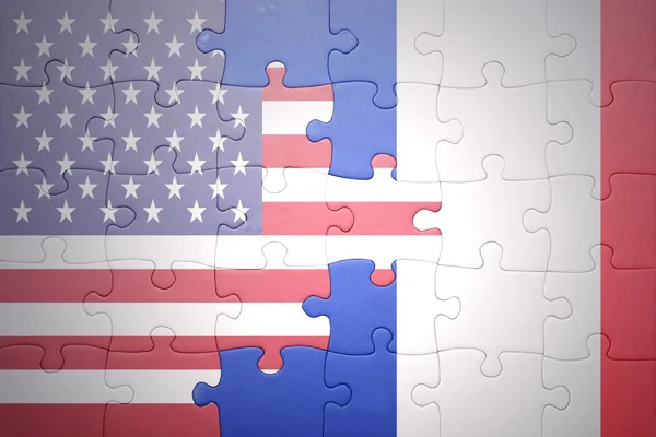 Puzzle Egyesült Államok és Franciaország nemzeti zászlókkal Jogdíjmentes Stock Képek