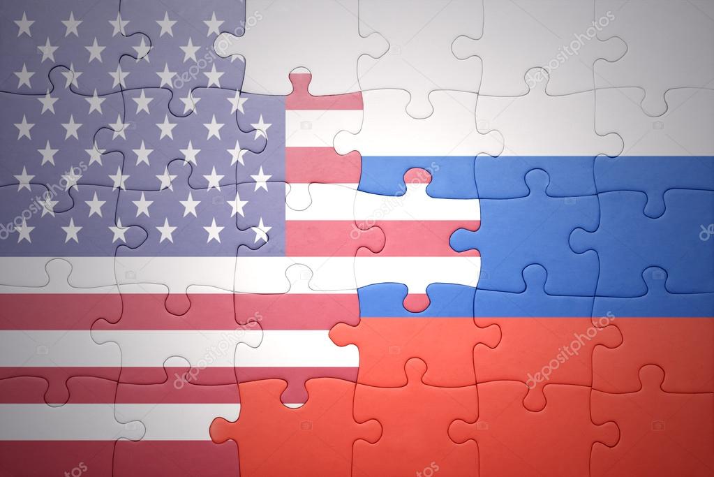 puzzle with the national flags of united states of america and russia