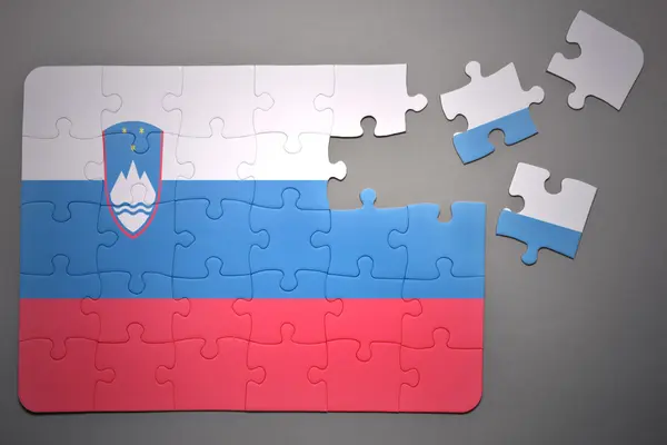 Puzzle with the national flag of slovenia — Stock Photo, Image