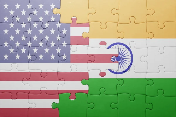 Puzzle with the national flag of united states of america and india — Stock Photo, Image